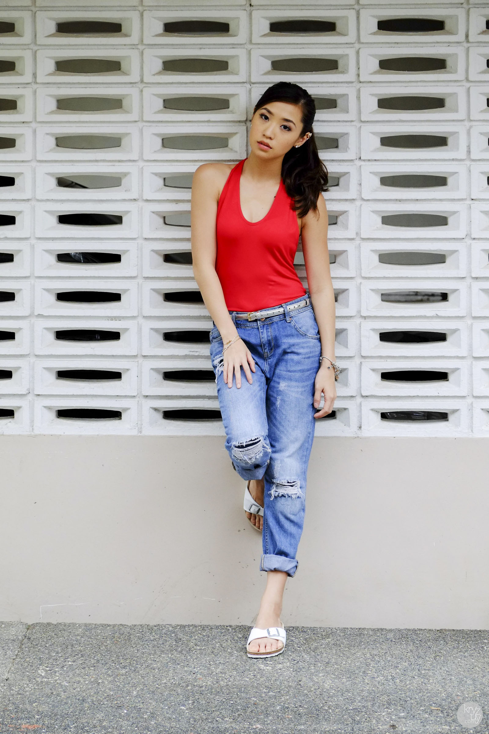 Ripped boyfriend jeans + Halter tank + Birkenstocks = Effortless cool